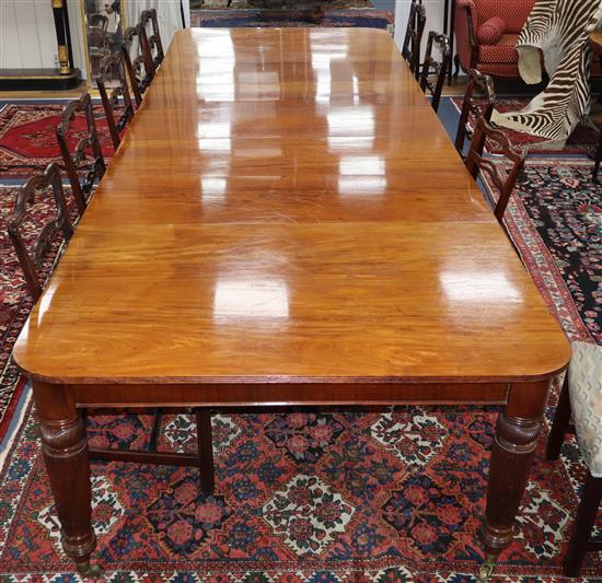 A late Victorian mahogany extending dining table on fine fluted tapered legs. 400cm extended